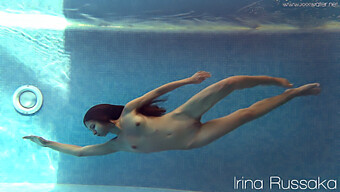 Stefanie Moon, A Petite, Skinny Brunette With Small Breasts, Indulges In Nude Swimming Pool Play